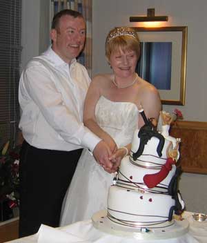Steve and Steff cut the cake