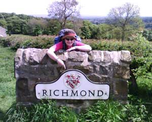 Steff pointing to the Richmond sign