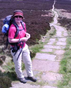 In the words of the song: The road is long, with many a winding turn.
But will the boots last out? Steff contemplating a very long trail